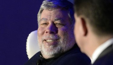 Apple co-founder Steve Wozniak, left, smiles as he answers a question from moderator Mike McGuire during the keynote luncheon of the 9th annual Southeast Venture Conference and Digital Summit Charlotte at the Le Meridien Charlotte on Wednesday, April 1, 2015, in Charlotte, N.C. (David T. Foster, III/Charlotte Observer/TNS via Getty Images)