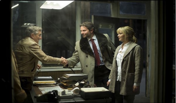 DF-12541_12542_R – Joy (Jennifer Lawrence) introduces home shopping executive Neil Walker (Bradley Cooper) to her father Rudy (Robert De Niro).