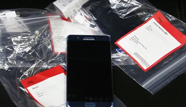 OREM, UT - SEPTEMBER 15: Several Samsung Galaxy Note 7's lay on a counter in plastic bags after they were returned to a Best Buy on September 15, 2016 in Orem, Utah.  The Consumer Safety Commission announced today a safety recall on Samsung's new Galaxy Note 7 smartphone after users reported that some of the devices caught fire when charging.  (Photo by George Frey/Getty Images)