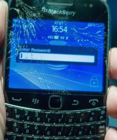 For a variety of reasons people with cracked Blackberry or Smartphone screens continue to use them if still functional seen February 24, 2014, in Washington, DC. AFP PHOTO/Paul J. Richards (Photo credit should read PAUL J. RICHARDS/AFP/Getty Images)