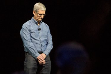 SAN FRANCISCO, CA - JUNE 13: Apple CEO Tim Cook leads the audience in a moment of silence in tribute to the victims of the Orlando terrorist event at an Apple event at the Worldwide Developer's Conference on June 13, 2016 in San Francisco, California. Thousands of people have shown up to hear about Apple's latest updates. (Photo by Andrew Burton/Getty Images)