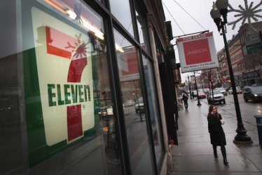 CHICAGO, IL - JANUARY 10:  A pedestrian walks past a 7-Eleven store on January 10, 2018 in Chicago, Illinois. Immigration officials raided nearly 100 7-Eleven stores across the country this morning checking the immigration status of store employees.  (Photo by Scott Olson/Getty Images)