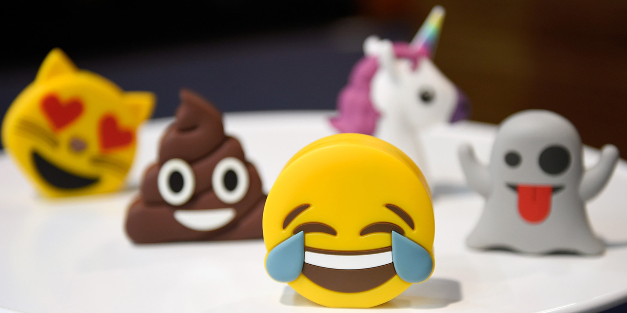 LAS VEGAS, NV - JANUARY 06: Batteries designed as emojis are displayed at the Philo booth at CES 2017 at the Las Vegas Convention Center on January 6, 2017 in Las Vegas, Nevada. CES, the world's largest annual consumer technology trade show, runs through January 8 and features 3,800 exhibitors showing off their latest products and services to more than 165,000 attendees.   David Becker/Getty Images/AFP