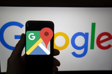 The logo of Google Maps is seen on a screen. In the background there is the logo of Google. Alphabet is the mother company of Google. It has a revenue of 117 billion dollars. (Photo by Alexander Pohl/NurPhoto via Getty Images)