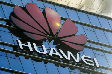 FILE - In this Dec. 18, 2018, photo, the logo of Huawei stands on its office building at the research and development centre in Dongguan in south China's Guangdong province. The U.S. Justice Department unsealed criminal charges Monday, Jan. 28, 2019 against Chinese tech giant Huawei, a top company executive and several subsidiaries, alleging the company stole trade secrets, misled banks about its business and violated U.S. sanctions. (AP Photo/Andy Wong, File)
