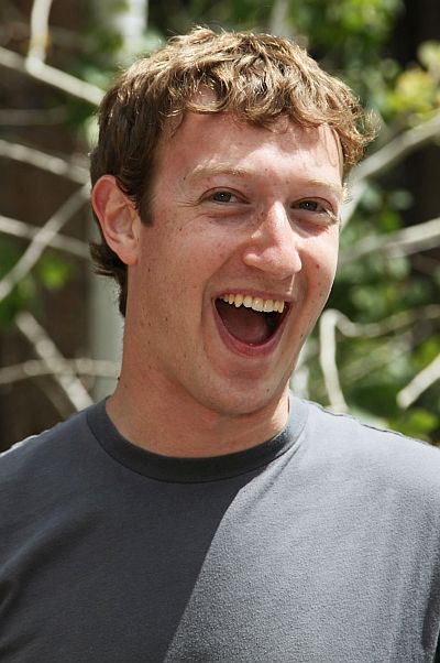 Mark Zuckerberg, Facebook CEO and founder laughs outside the Sun Valley Inn in Sun Valley, Idaho July 9, 2009. The resort is the site for the annual Allen & Co's media and technology conference.    REUTERS/Rick Wilking (UNITED STATES BUSINESS SCI TECH MEDIA) - RTR25I6M