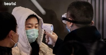 BEIJING, CHINA - JANUARY 23: A Chinese passenger that just arrived on the last bullet train from Wuhan to Beijing is checked for a fever by a health worker at a Beijing railway station on January 23, 2020 in Beijing, China. The number of cases of a deadly new coronavirus rose to over 500 in mainland China Wednesday as health officials locked down the city of Wuhan in an effort to contain the spread of the pneumonia-like disease which medicals experts have been confirmed can be passed from human to human. In an unprecedented move, Chinese authorities put travel restrictions on the city of 11 million and two other neighbouring cities preventing people from leaving after 10 AM local time Thursday. The number of those who have died from the virus in China climbed to at least 17 on Thursday and cases have been reported in other countries including the United States,Thailand, Japan, Taiwan and South Korea. (Photo by Kevin Frayer/Getty Images)