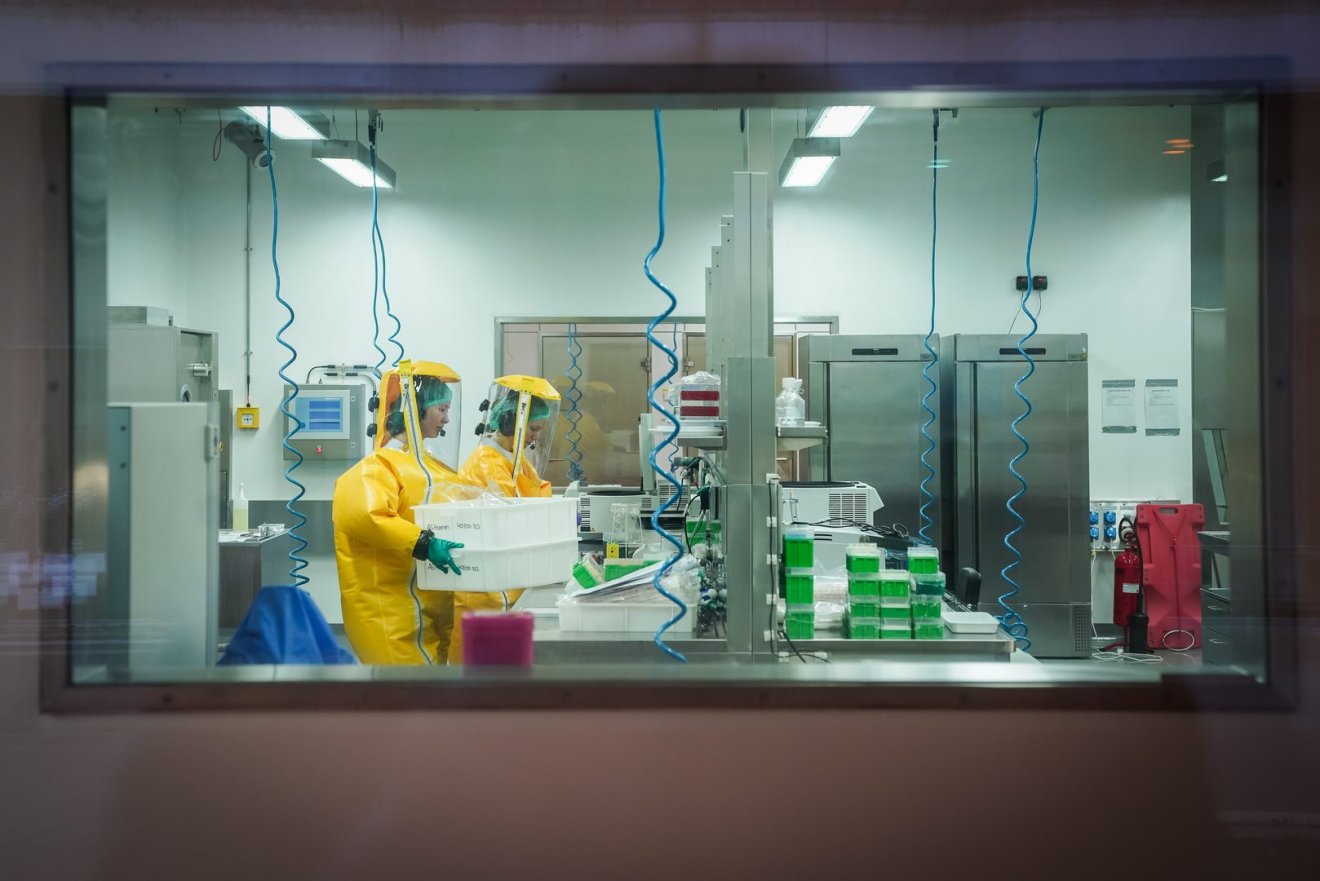 GREIFSWALD, GERMANY - DECEMBER 02: Scientists work in one of the high security laboratories of the Friedrich-Loeffler Institute on the island of Riems near Greifswald on December 02, 2019 in Greifswald, Germany. The Friedrich Loeffler Institute is investigating whether climate change will precipitate the spread of tropical, mosquito-born diseases to Germany. Germany registered its first modern cases of West Nile virus earlier this year. (Photo by Steffen Kugler/Getty Images)