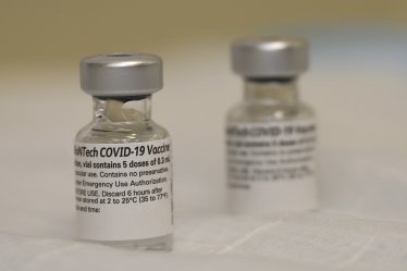 Vials of the COVID-19 vaccine are seen at Walter Reed National Military Medical Center, Bethesda, Md., Dec. 14, 2020.