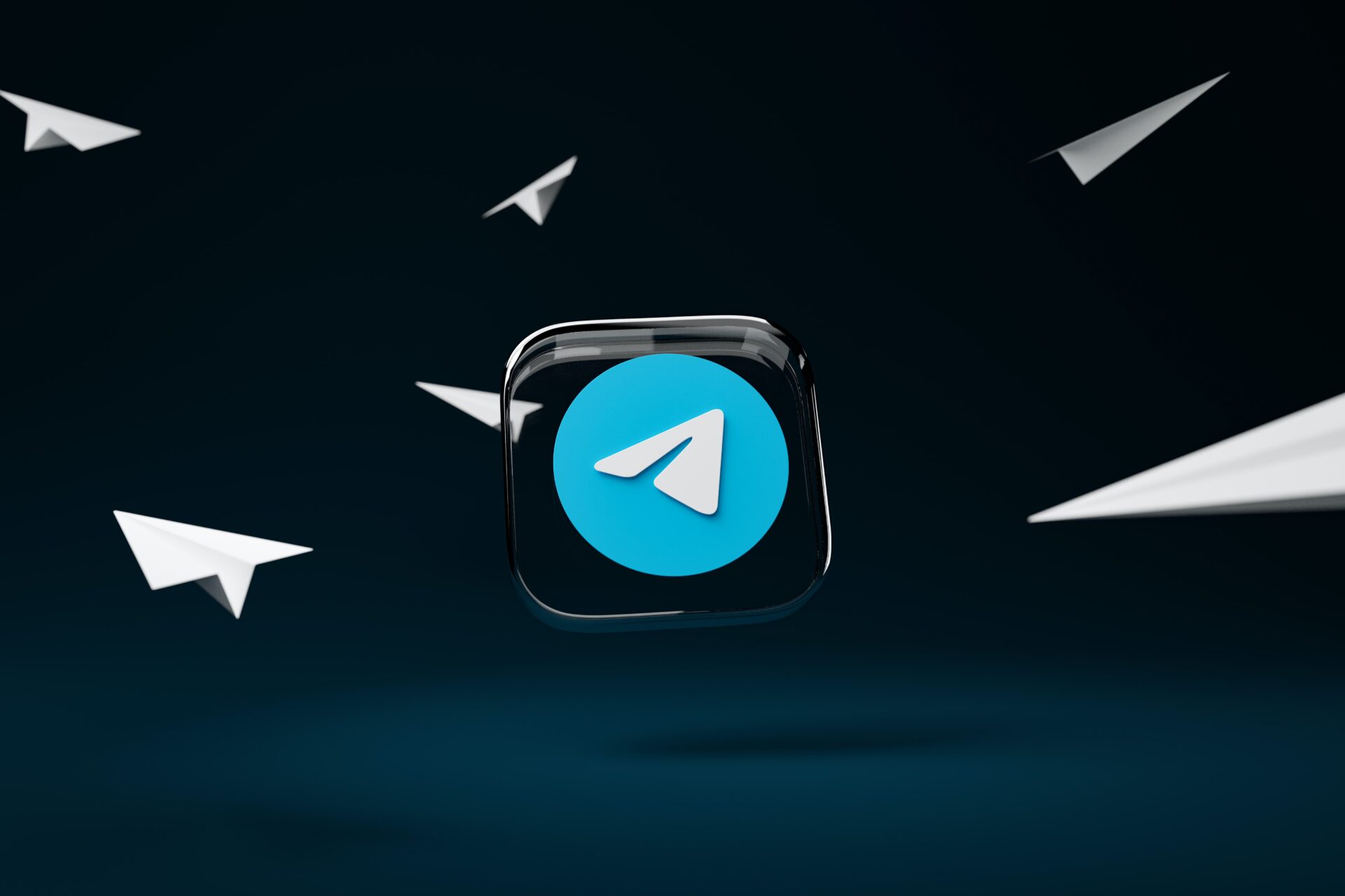 Telegram Application Icon in a black background, the paper plane flying through in the image represents Telegram app users