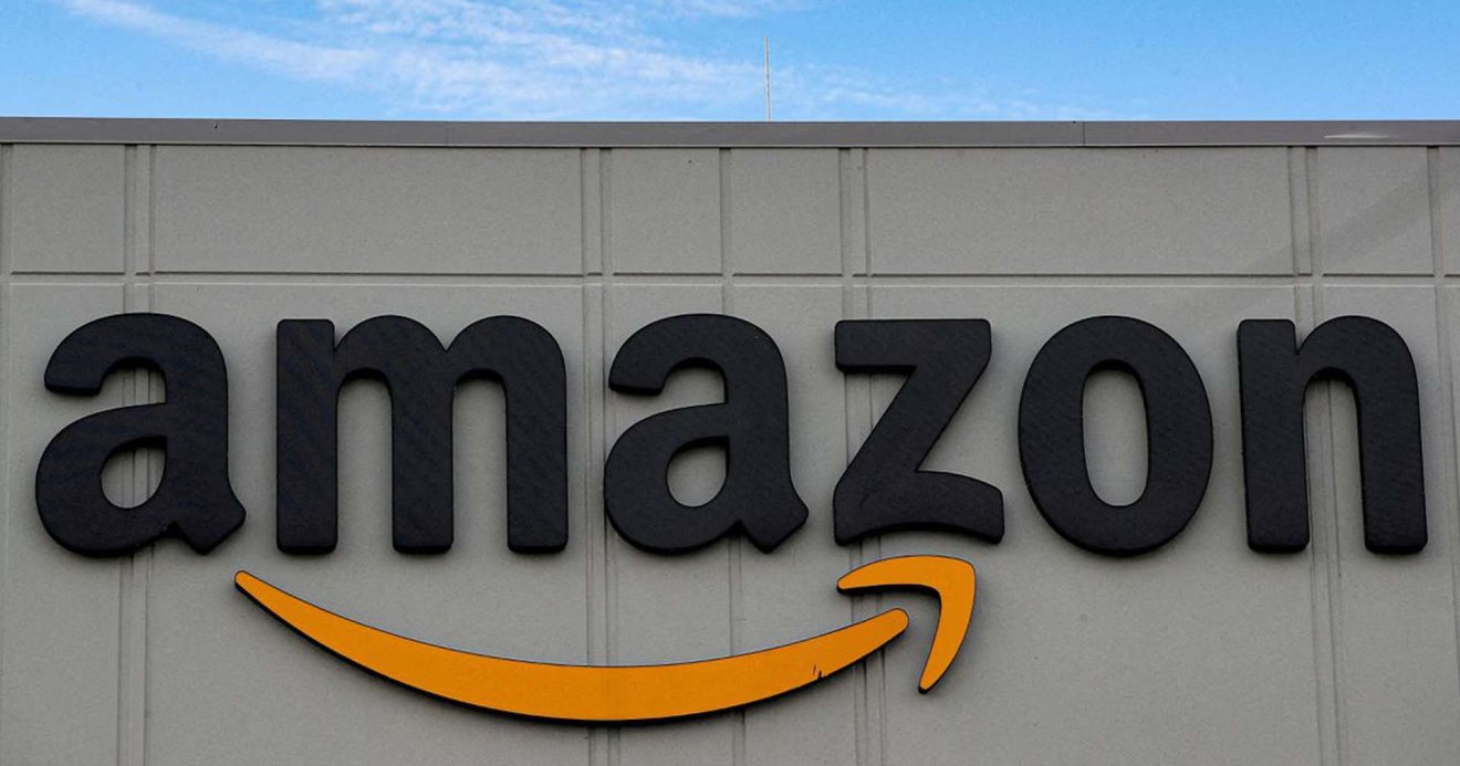 Amazon to freeze hiring