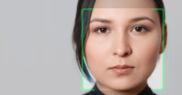 scans face by smart phone using facial recognition system