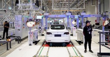 Tesla China-made Model 3 vehicles are seen during a delivery event at its factory in Shanghai