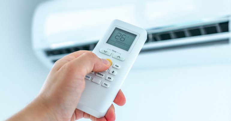 air-conditioner-temperature-adjustment-with-remote-controller
