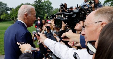 U.S. President Joe Biden speaks to members of the media