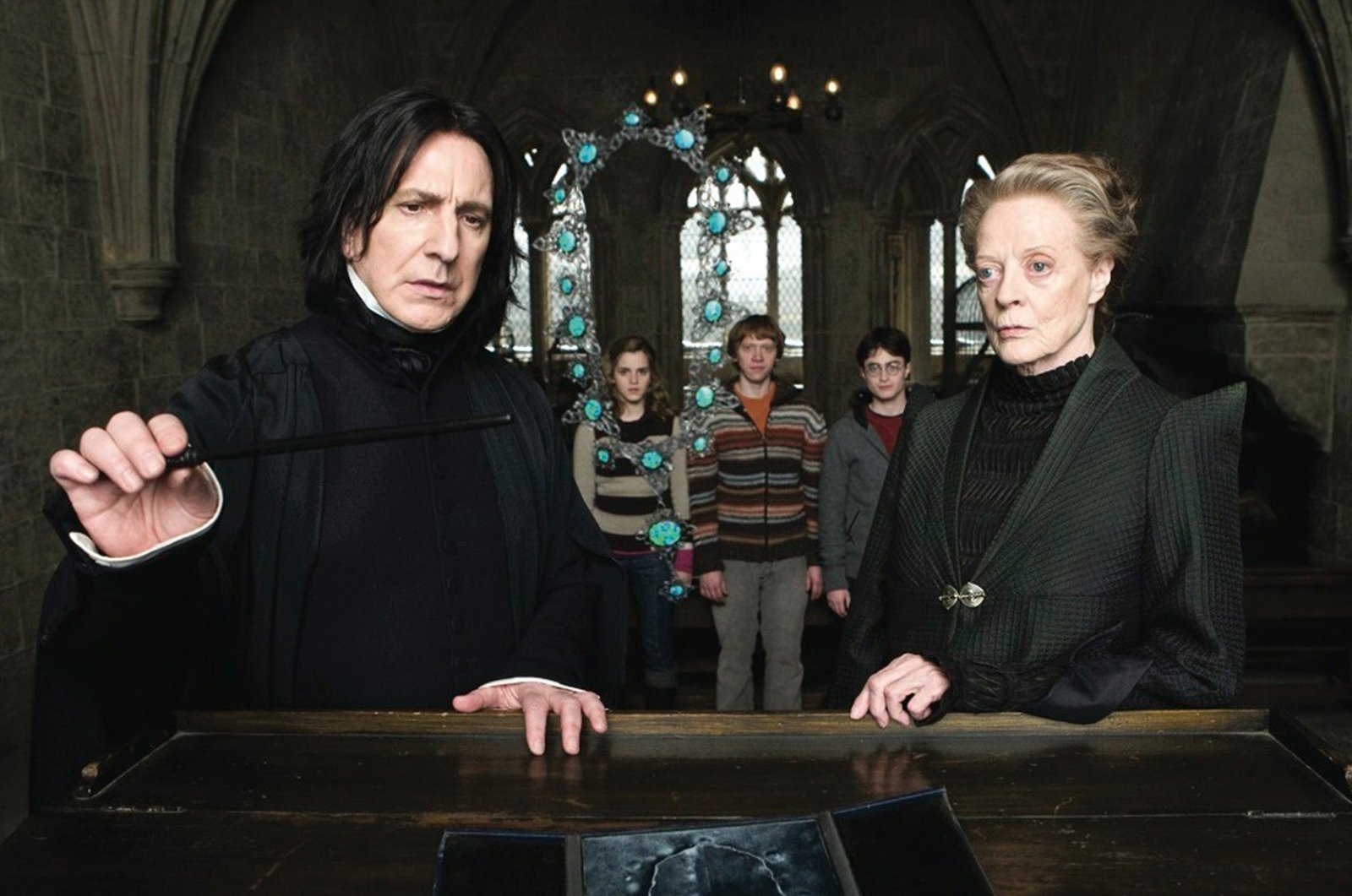 Alan Rickman, Maggie Smith, Rupert Grint, Daniel Radcliffe, and Emma Watson in Harry Potter and the Half-Blood Prince