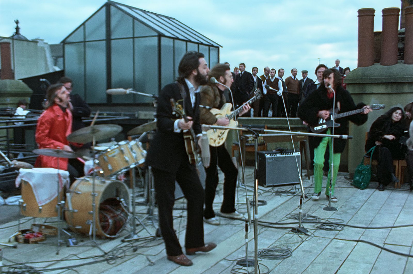 Ringo Starr, Paul McCartney, John Lennon, and George Harrison in THE BEATLES GET BACK. Photo courtesy of Apple Corps Ltd